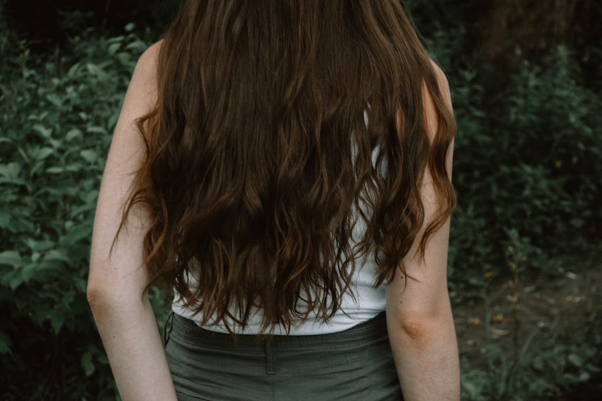 a person with the hair back